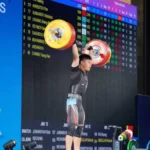 Rahmat Erwin Abdullah Hattrick Emas Pecahkan Rekor Asia Angkat Besi